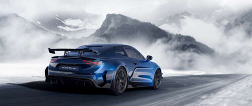 A detailed view of the Alpine A110 R Ultime sports car, showcasing its aerodynamic... UWUHD wallpaper