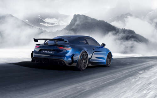 A detailed view of the Alpine A110 R Ultime sports car, showcasing its aerodynamic... 7680x4800 high definition wallpaper