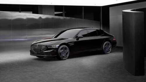 A high-end Genesis G90 luxury sedan displayed in a professional setting. 4K (Ultra HD) wallpaper for pc download