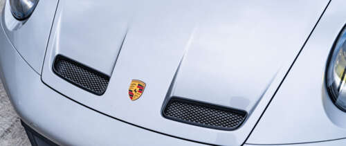 A high-performance Porsche GT3 RS sports car showcasing its sleek aerodynamic design. UWUHD wallpaper