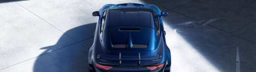 A detailed view of the Alpine A110 R Ultime sports car, highlighting its sleek aerodynamic... Dual UHD wallpaper