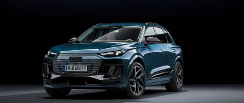 A high-detail view of a modern Audi Q6 E-tron electric luxury SUV. UWUHD computer backgrounds