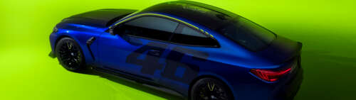 A sleek BMW M4 CS Edition featuring the yellow and black VR46 Valentino Rossi racing... Dual UHD wallpaper for laptop download