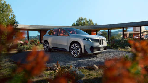 A futuristic BMW Vision Neue Klasse X electric concept car with a modern, aerodynamic... 4K (Ultra HD) wallpaper for laptop download