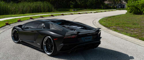 A sleek, high-end Lamborghini supercar captured in high detail. UWUHD free desktop wallpaper