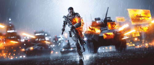 A heavy military tank traversing a smoky and debris-strewn battlefield during an... UWUHD hd background