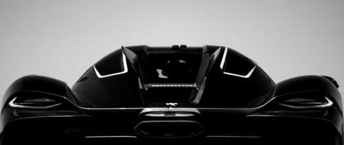 A detailed view of the aerodynamic Koenigsegg Jesko Absolut hypercar. UWUHD free wallpaper