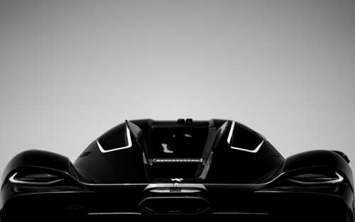 A detailed view of the aerodynamic Koenigsegg Jesko Absolut hypercar. 7680x4800 computer backgrounds