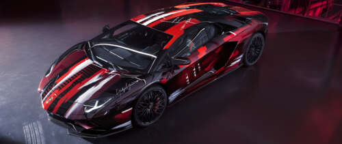 A sleek and powerful Lamborghini Aventador S supercar showcasing its aerodynamic... UWUHD wallpaper images