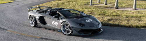 A sleek and powerful Lamborghini Huracan supercar showcasing its aerodynamic design... Dual UHD hd background