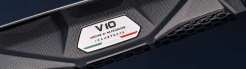A sleek Lamborghini Huracán supercar captured in high detail, showcasing its aerodynamic... Dual UHD computer backgrounds