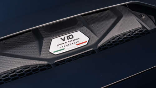 A sleek Lamborghini Huracán supercar captured in high detail, showcasing its aerodynamic... 8K pictures for wallpaper