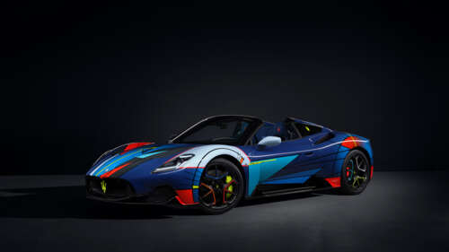 A high-performance Maserati MC20 supercar featuring a sleek, aerodynamic design and... 8K desktop wallpaper