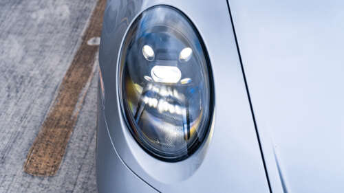 A high-performance Porsche GT3 RS sports car featuring an aggressive aerodynamic... 8K hd background