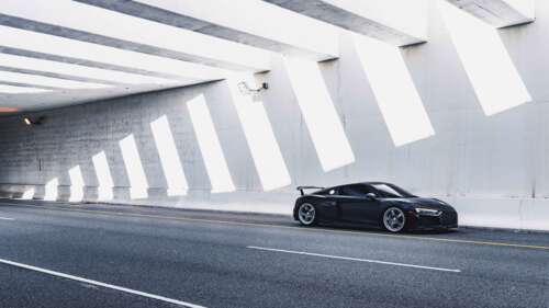 A close-up view of a sleek, modern Audi luxury car showcasing its elegant lines and... 4K (Ultra HD) wallpaper download