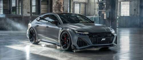 A high-performance Audi RS7 sedan with a sleek, metallic body and aggressive front... UWUHD desktop wallpaper