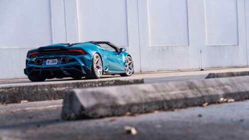 A detailed view of a Lamborghini Huracan Evo featuring its iconic aerodynamic body... 4K (Ultra HD) desktop wallpaper