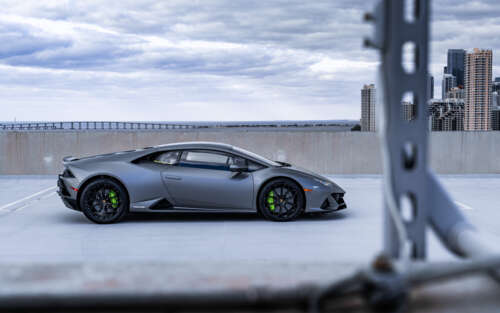 A close-up view of a powerful Lamborghini Huracan sports car highlighting its aerodynamic... 7680x4800 wallpaper for laptop download