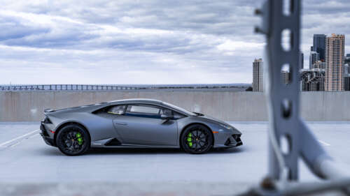 A close-up view of a powerful Lamborghini Huracan sports car highlighting its aerodynamic... 4K (Ultra HD)
