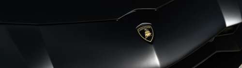 A sleek and aerodynamic Lamborghini supercar featuring a polished-metallic exterior... Dual UHD wallpaper download