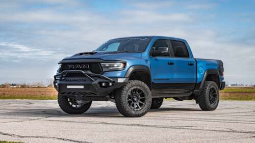 A massive, lifted Hennessey Mammoth 1000 Dodge Ram truck with aggressive off-road... 4K (Ultra HD) wallpaper for pc download