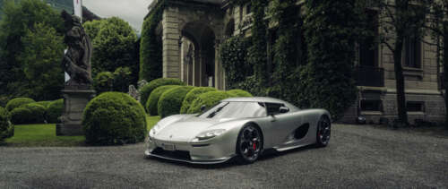 A detailed and sleek view of the Koenigsegg CC850 hypercar highlighting its aerodynamic... UWUHD free wallpaper