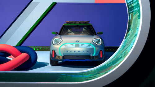 A high-resolution shot of a MINI Aceman electric vehicle showcasing its sleek, modern... 8K free hd wallpapers