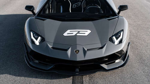 A close-up view of a sleek, high-performance Lamborghini Huracan supercar. 8K background images hd