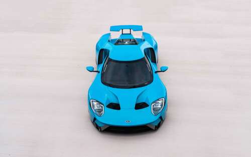 A sleek and powerful Ford GT supercar featuring aerodynamic design and a polished... 7680x4800 wallpaper images