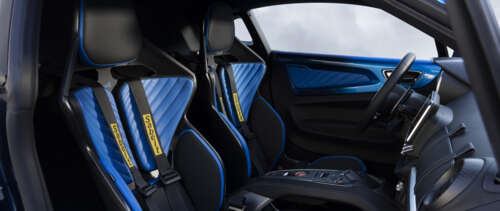 Close-up view of the driver's cockpit and interior details of an Alpine A110 R Ultime... UWUHD free background images