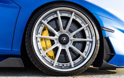 A high-performance Lamborghini Aventador SVJ supercar featuring sleek lines and aggressive... 7680x4800 wallpaper for laptop download