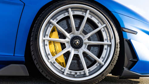 A high-performance Lamborghini Aventador SVJ supercar featuring sleek lines and aggressive... 8K free wallpaper