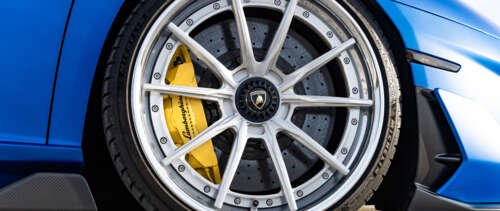 A high-performance Lamborghini Aventador SVJ supercar featuring sleek lines and aggressive... UWUHD background images hd