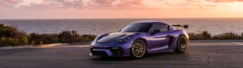 A high-performance Porsche GT3 RS sports car captured in high detail. Dual UHD computer backgrounds