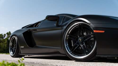 A high-resolution shot of a luxury Lamborghini supercar with a sleek, aerodynamic... 8K wallpaper for pc download
