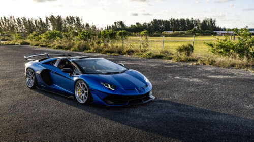 A high-performance Lamborghini supercar featuring iconic aerodynamic curves and a... 8K pictures for wallpaper