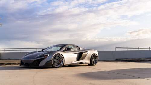 A high-performance McLaren supercar featuring sleek aerodynamic lines and a polished... 4K (Ultra HD) background images hd
