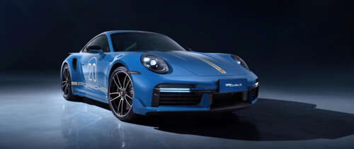 A detailed view of a sleek, high-performance Porsche 911 Turbo sports car featuring... UWUHD ps4 wallpaper