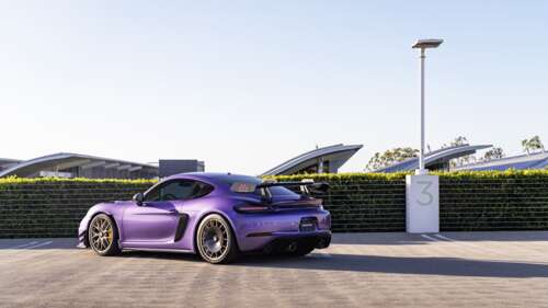A high-performance Porsche GT3 RS sports car featuring aggressive aerodynamic styling. 8K