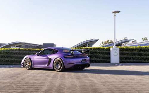 A high-performance Porsche GT3 RS sports car featuring aggressive aerodynamic styling. 7680x4800 wallpaper for laptop download