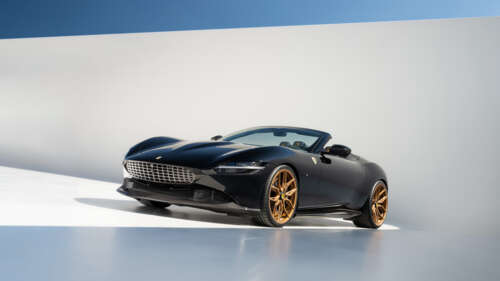 A sleek and polished Ferrari Roma luxury sports car highlighting its aerodynamic... 8K wallpaper images