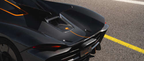 A sleek and aerodynamic Koenigsegg Jesko Absolut hypercar in a high-performance setting. UWUHD ps4 wallpaper