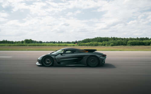 A sleek and aerodynamic Koenigsegg Jesko Absolut hypercar presented in a high-detail... 7680x4800 pictures for wallpaper