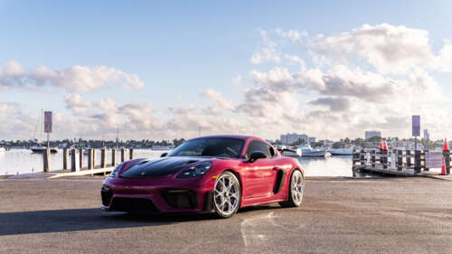 A close-up view of a high-performance Porsche sports car showcasing its luxurious... 8K ps4 wallpaper