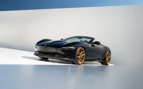 A sleek and polished Ferrari Roma luxury sports car highlighting its aerodynamic... 7680x4800 free wallpaper