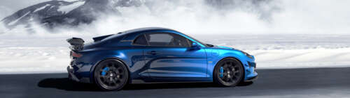 A detailed view of the Alpine A110 R Ultime sports car, highlighting its aerodynamic... Dual UHD free background