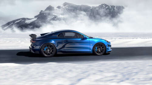 A detailed view of the Alpine A110 R Ultime sports car, highlighting its aerodynamic... 8K high definition wallpaper