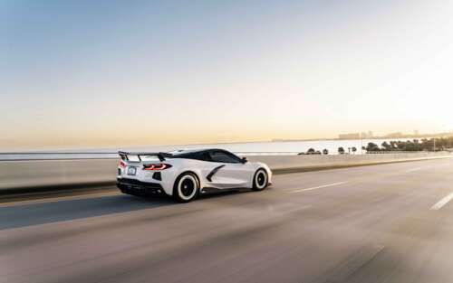 A high-performance Chevrolet Corvette C8 sports car with sleek, aerodynamic lines... 7680x4800 free background images