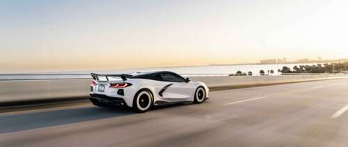 A high-performance Chevrolet Corvette C8 sports car with sleek, aerodynamic lines... UWUHD pictures for wallpaper
