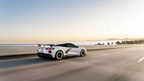 A high-performance Chevrolet Corvette C8 sports car with sleek, aerodynamic lines... 4K (Ultra HD) free wallpaper